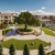 a courtyard with people and trees