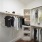 Primary walk-in closet showcasing built-in shelves, hanging space, and organized storage solutions for clothing and accessories.