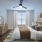 Primary bedroom with large windows, neutral tones, and ample space, creating a calm and inviting retreat.